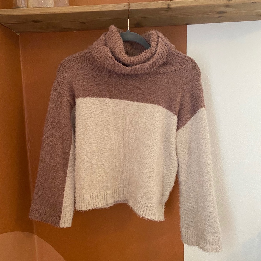 Asymmetrical colored sweater